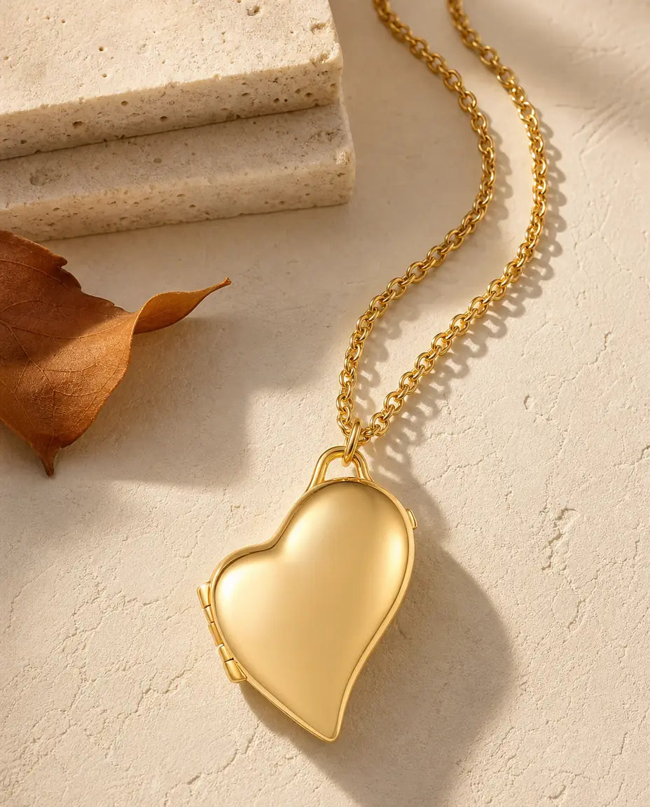 Personalised asymmetric heart photo locket necklace holding two pictures, silver and gold