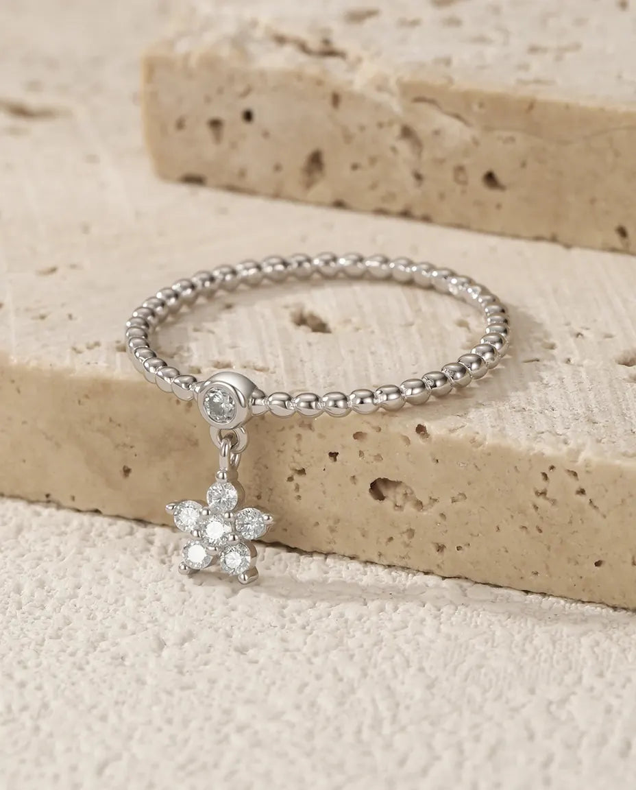 Daisy flower moissanite ring with dangling charm in 925 sterling silver