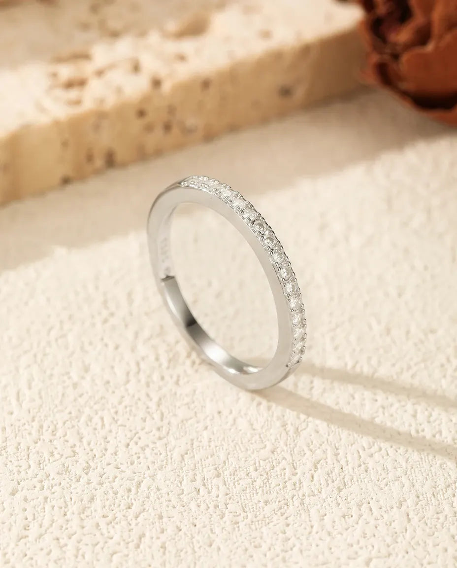 Pavé moissanite wedding band in 925 sterling silver with round D colour stones