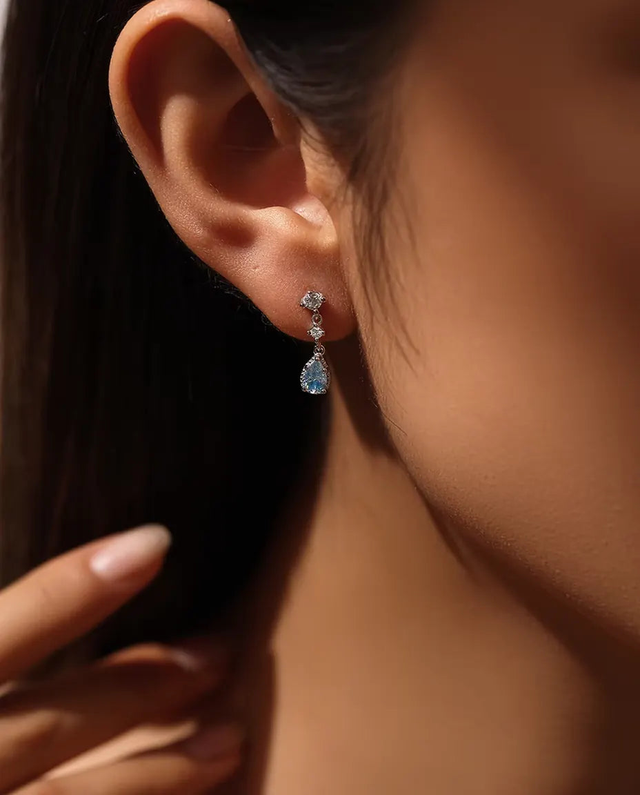 Aqua Blue Moissanite Drop Earrings - 0.50 ct 4 x 6 mm Pear Stone per Earring with Cubic Zirconia Accents, 925 Sterling Silver