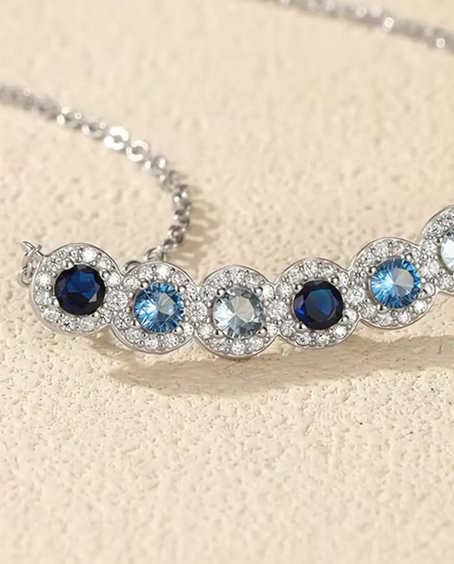 Blue Ombre Bar Necklace - Six Halo Set Blue Stones on a 34 mm Curved Bar, 925 Sterling Silver, 40 + 5 cm