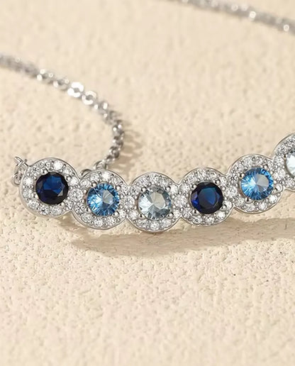 Blue Ombre Bar Necklace - Six Halo Set Blue Stones on a 34 mm Curved Bar, 925 Sterling Silver, 40 + 5 cm