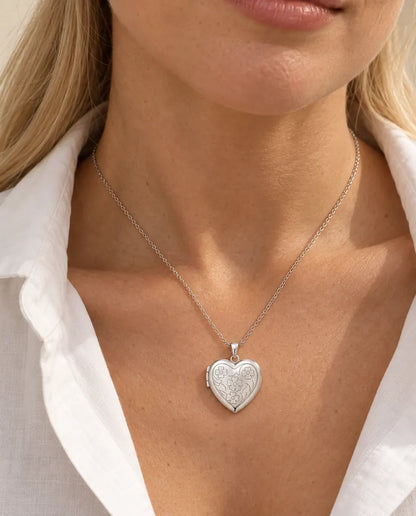 Personalised Photo Locket Necklace That Holds 2 Pictures - Floral Carved Heart Locket With Mother of Pearl Back worn on a model