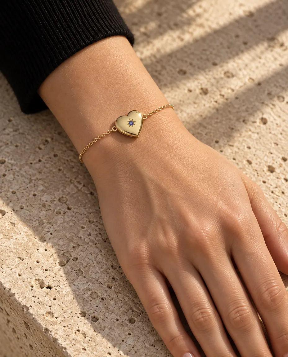 Close view of the heart photo locket bracelet on the wrist