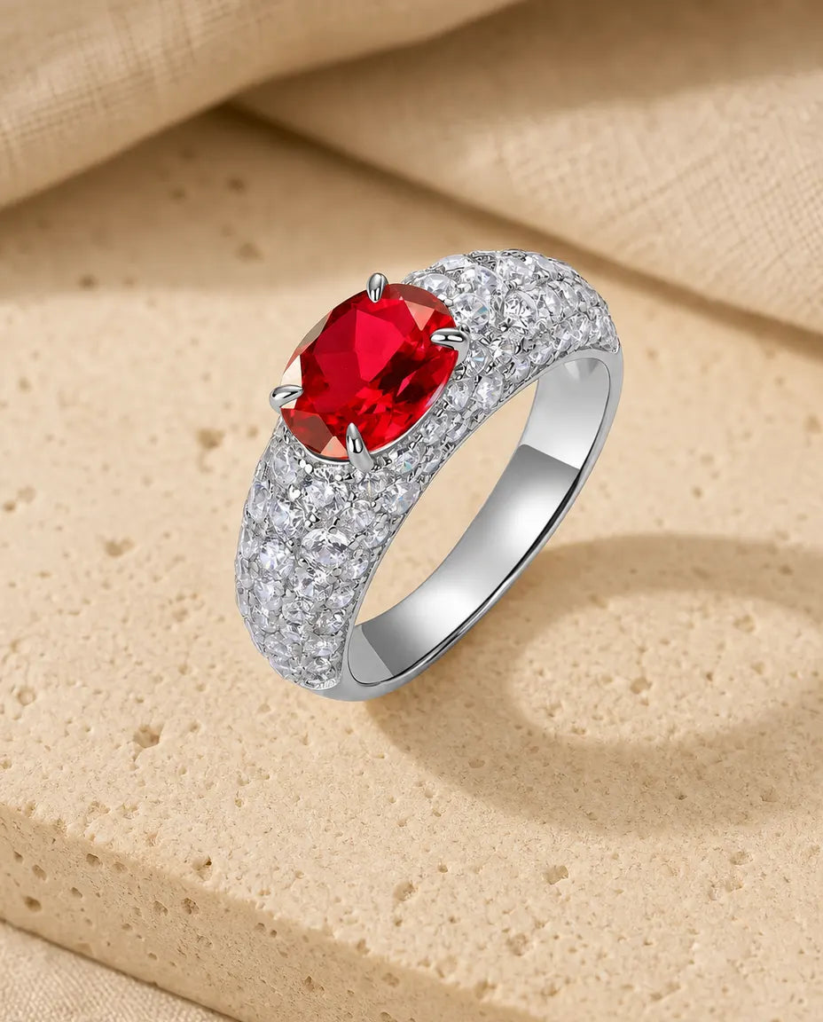 Lab ruby east west oval pave statement ring in sterling silver with domed band