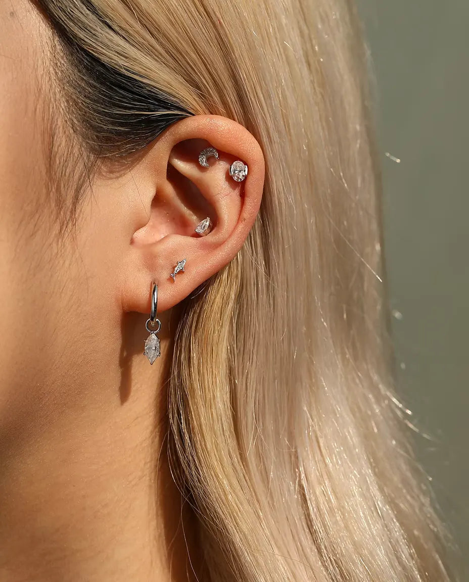 Marquise Moissanite Charm Huggie Hoop Earrings in 925 Sterling Silver - worn together with other studs in the same ear