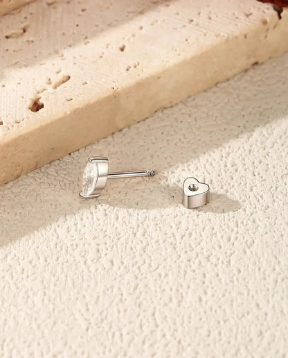 Marquise Moissanite Stud Earrings in 925 Sterling Silver - with the heart-shaped back taken off and set beside it