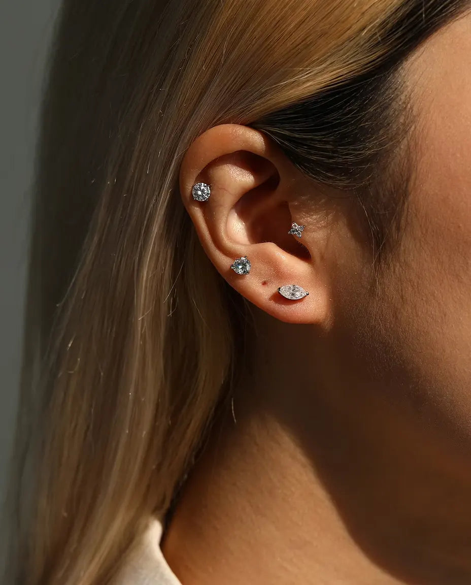 Marquise Moissanite Stud Earrings in 925 Sterling Silver - worn in an ear stack, profile view