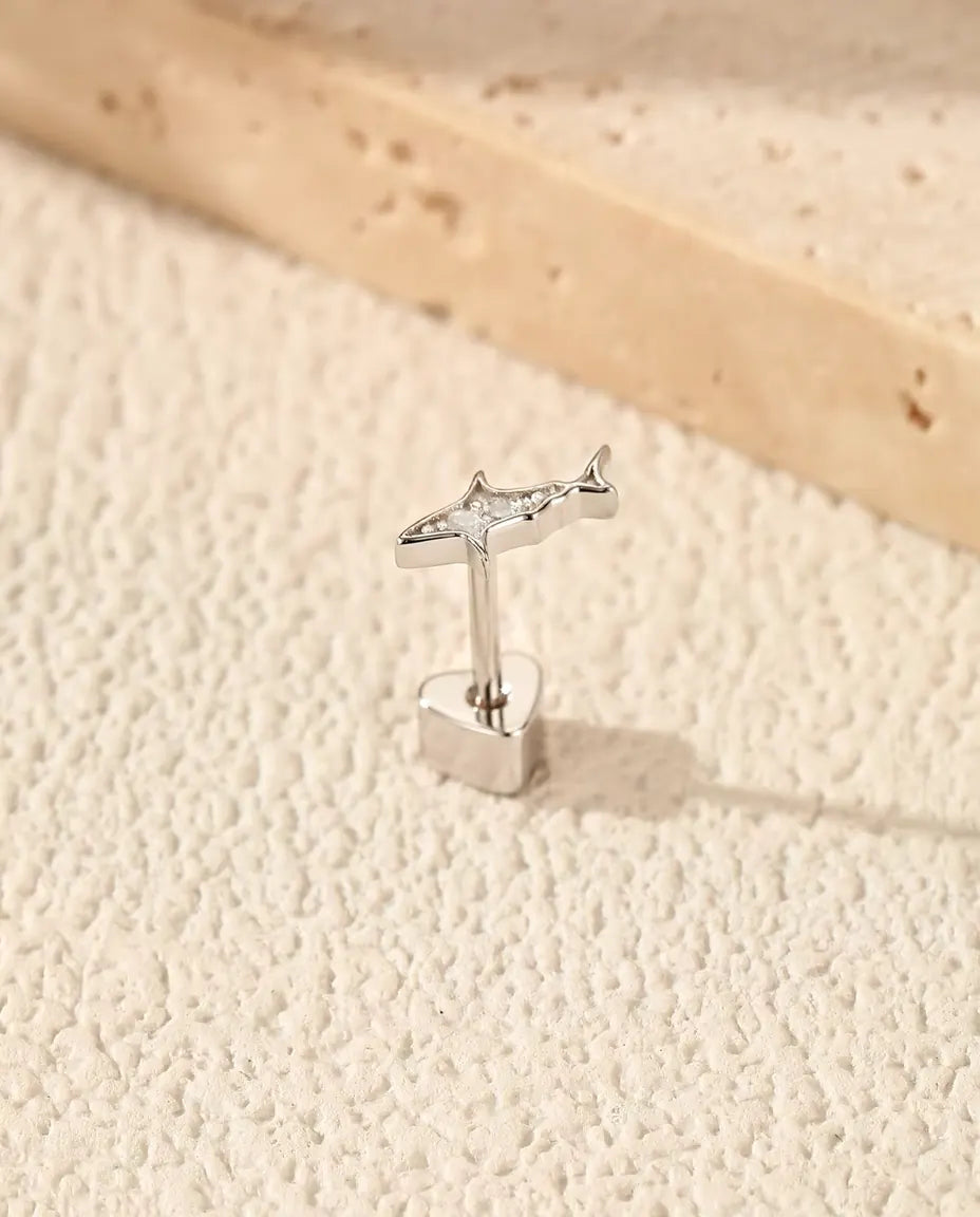 Shark Stud Earrings in 925 Sterling Silver with Moissanite - standing on its heart-shaped back, angled view