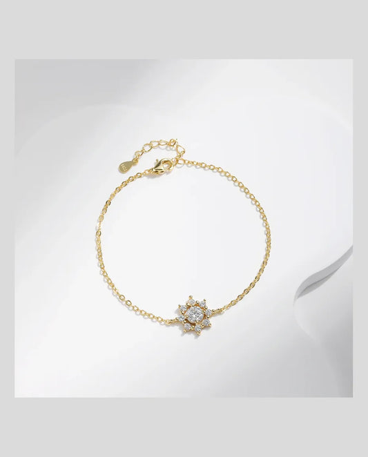 Gold-plated moissanite snowflake charm bracelet in 925 sterling silver