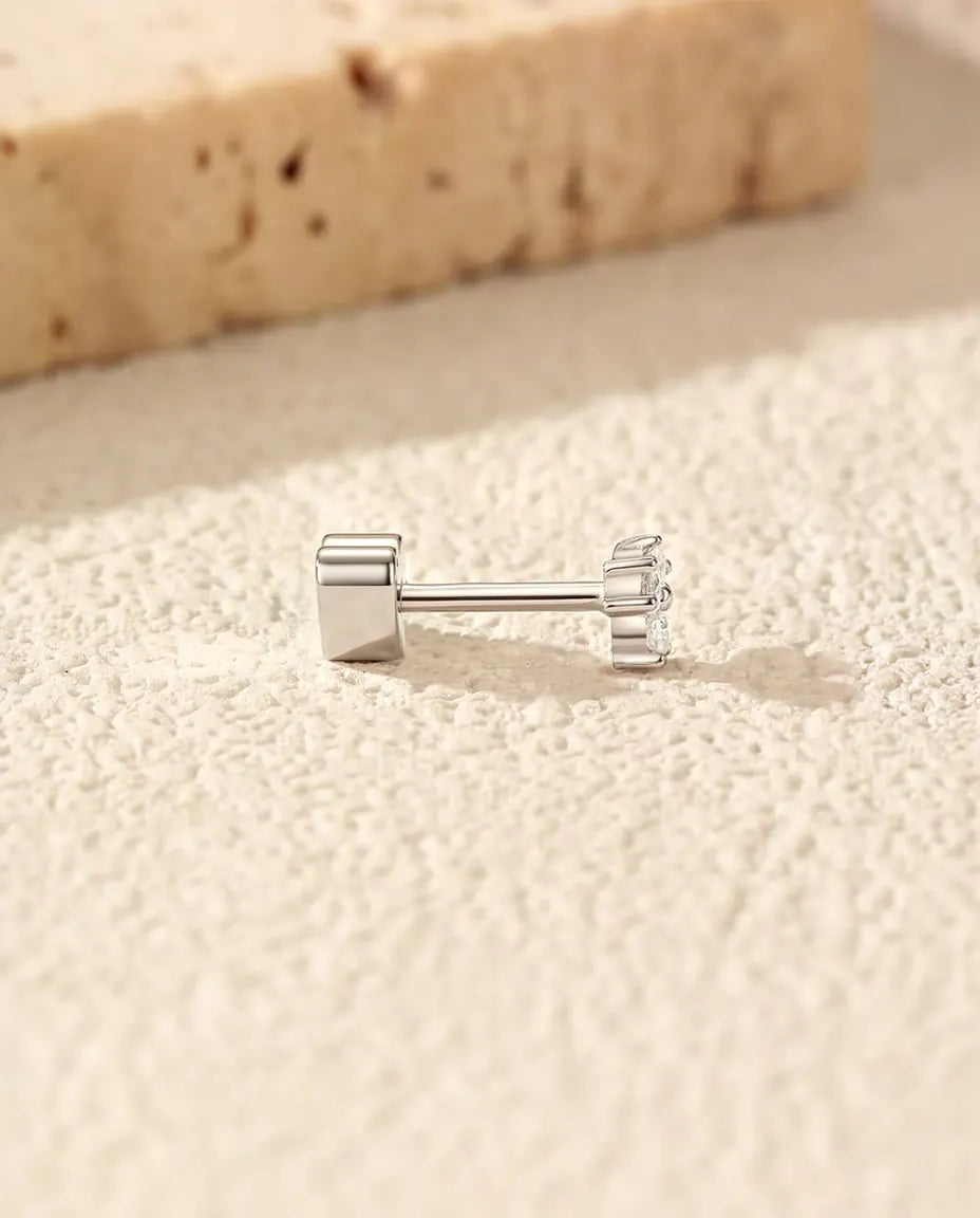Three-Stone Moissanite Trefoil Stud Earrings in 925 Sterling Silver - side view showing the post and heart-shaped back