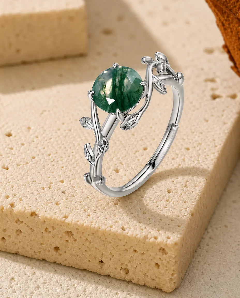 Moss agate vine leaf adjustable ring in sterling silver with round rose-cut stone and sculpted leaf band