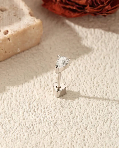 Pear Moissanite Stud Earrings in 925 Sterling Silver - standing on its heart-shaped back, angled view