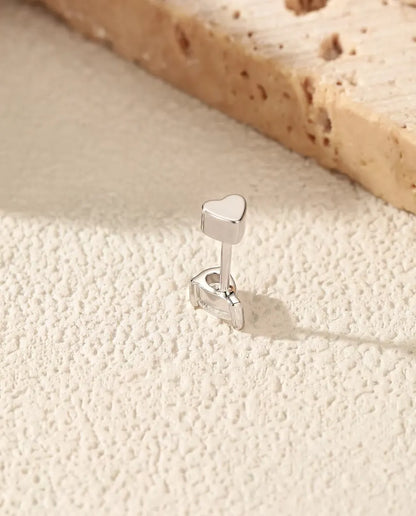 Pear Moissanite Stud Earrings in 925 Sterling Silver - standing with the heart-shaped back on top, seen from behind