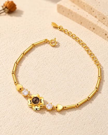 Gold tone heart petal clover photo projection bracelet with spring ring clasp and extender