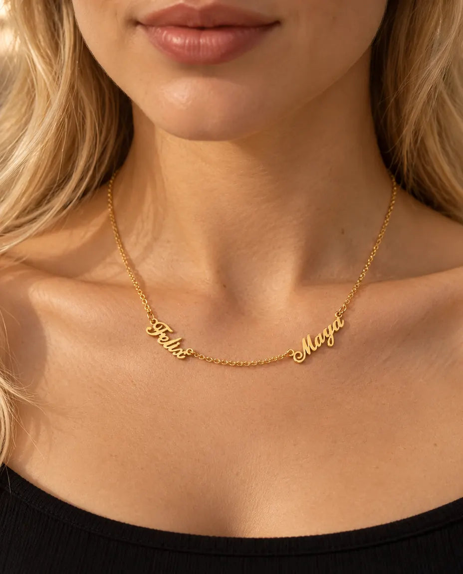Personalised Two Name Necklace in 925 Sterling Silver - Two Script Nameplates Joined by Chain - worn on a model in gold