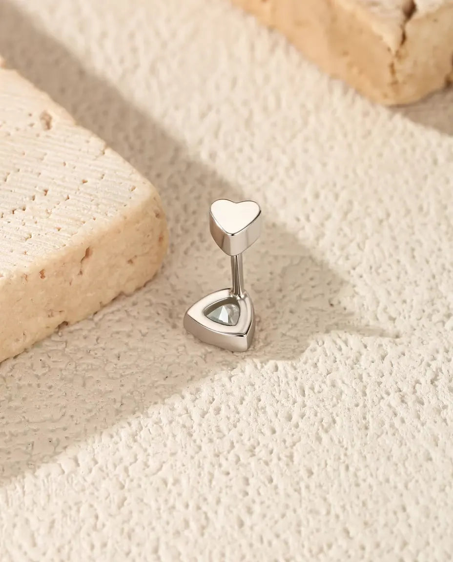 Trillion Moissanite Bezel Stud Earrings in 925 Sterling Silver - standing with the heart-shaped back on top, seen from behind